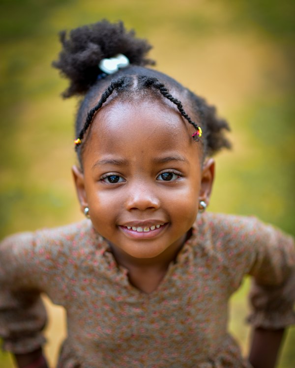 Smiling girl with braids